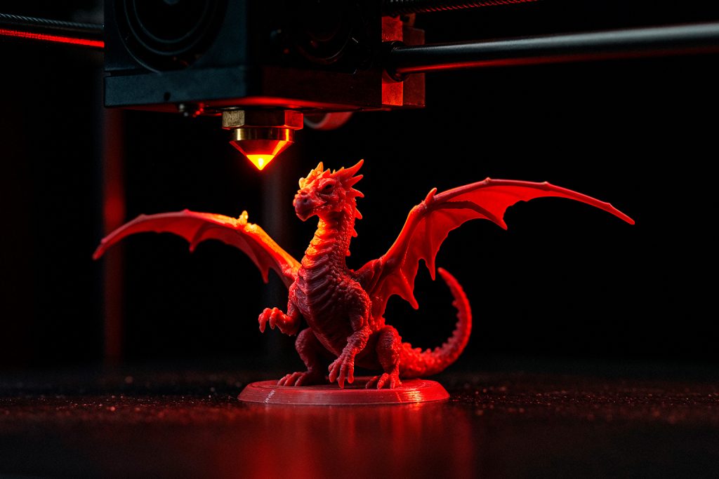 3d modelling and rendering of a dragon that is getting printed on a 3d printer